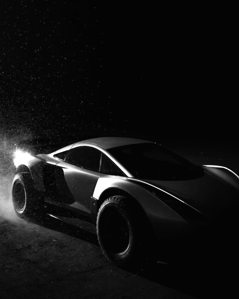 A raised performance car finished for off-road use